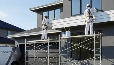 Professional trim and fascia painting on Redmond WA home exterior by expert house painters